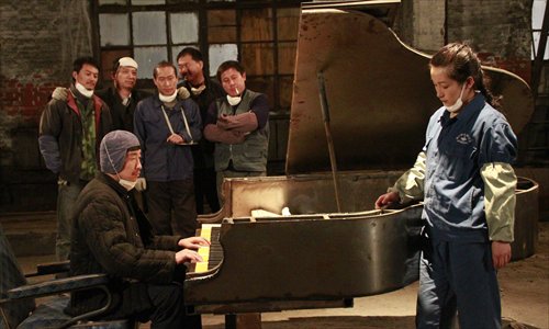 To mark the 55th anniversary of diplomatic ties, Cambodia screens several Chinese films, including <em>The Piano in a Factory</em>. Photo: CFP