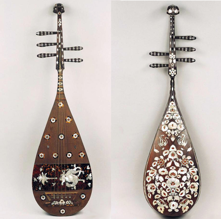 Antique Asian music instrument, pipa, hung in wall in a music