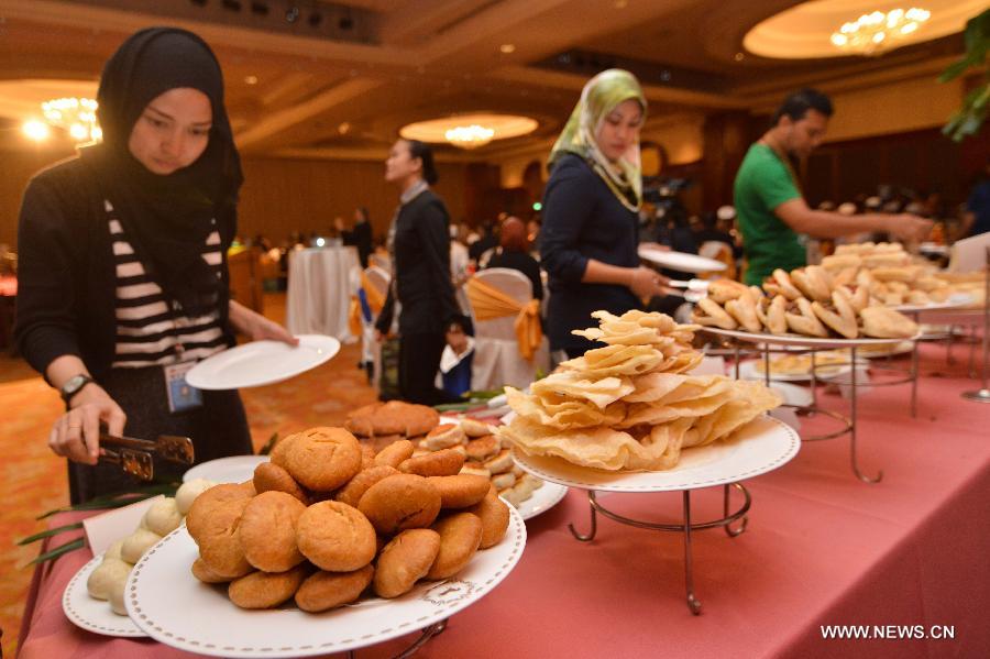 The Halal food presented by China Cuisine Association is seen during a tasting event in Kuala Lumpur, Malaysia, July 5, 2014. [Photo/Xinhua]