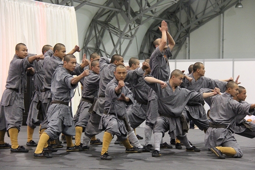 Disciples perform ahead of a press conference for the 3rd Shaolin Cultural Festival in London, UK on Oct 8, 2014. [Photo/Xinhua]