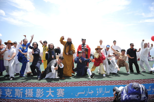 Representatives from 11 factions of wushu, or Chinese martial arts show their skills during the Tianshan Mountain Cultural Week in Tekes county, August 3, 2013. 